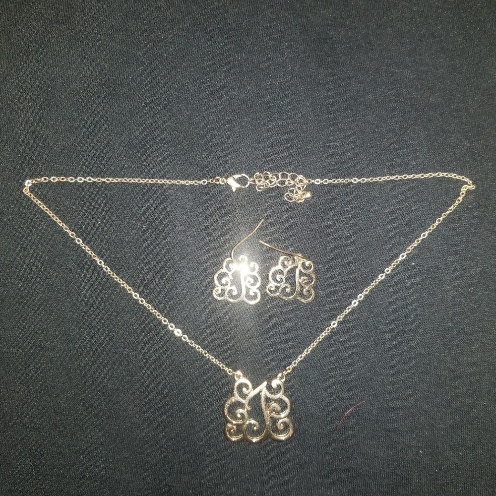 Gold scroll necklace and earring set